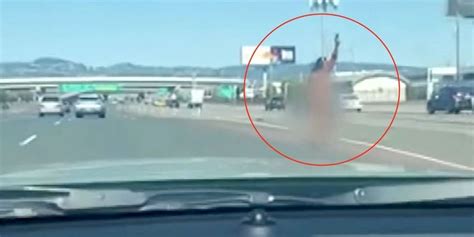 naked woman shooting on highway|Video shows naked woman running with a gun on Bay Bridge